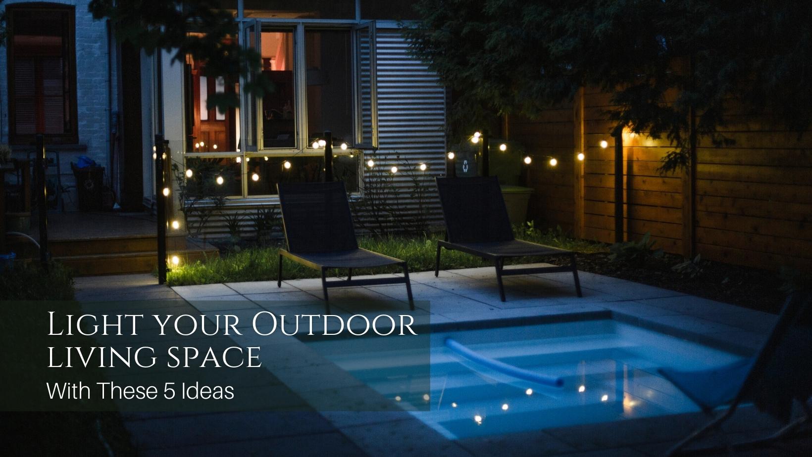 Outdoor string lights with a swimming pool in the back yard